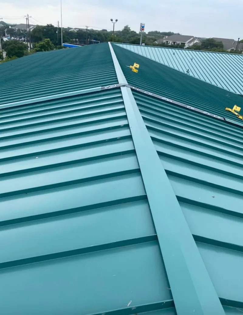 Green commercial metal roof ridge and valley for Metal Roof Repair in Andalusia